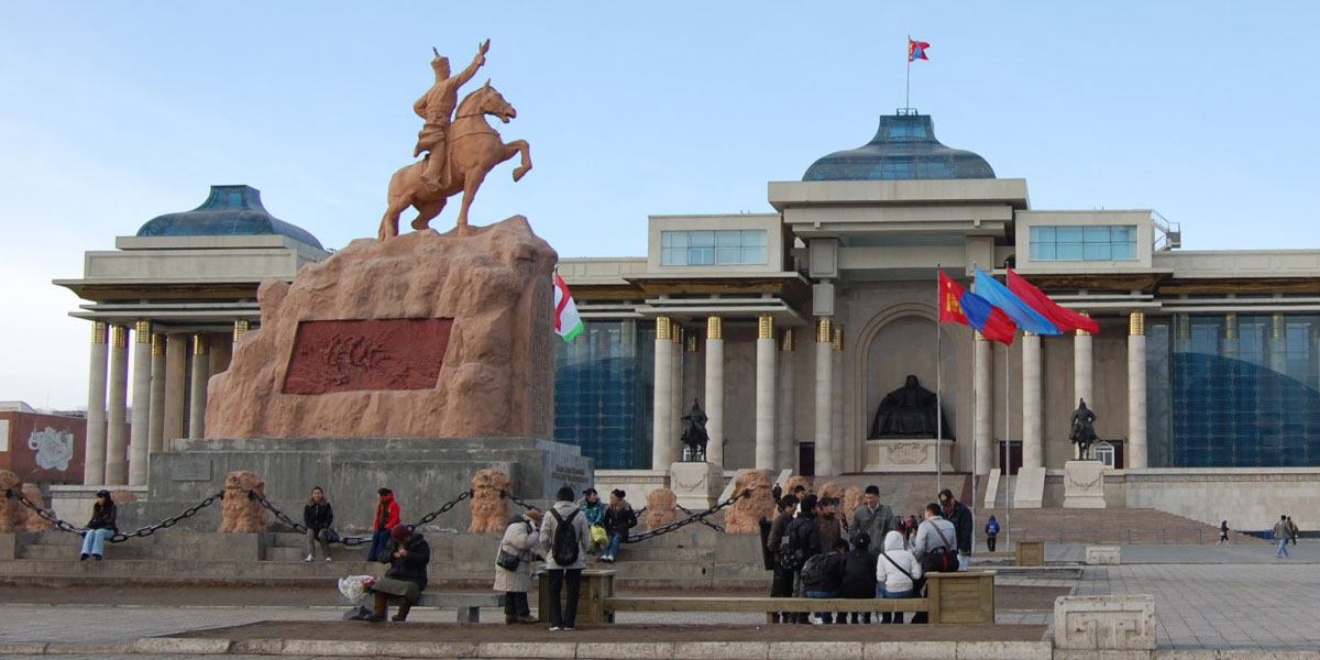 a building with a statue out front