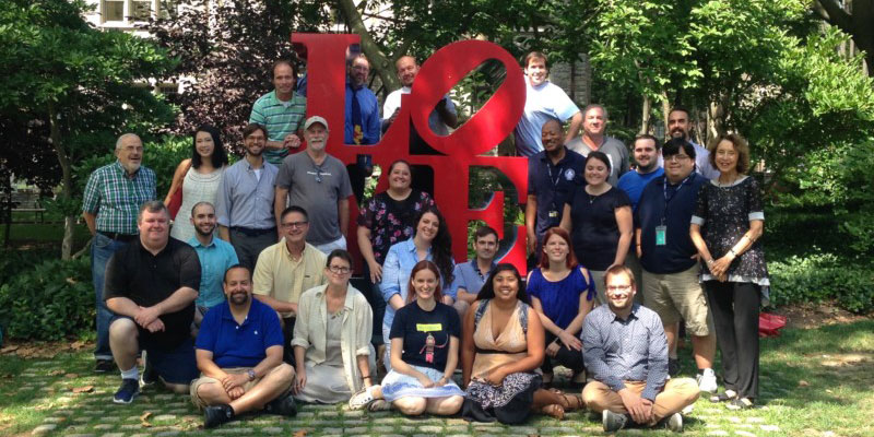 2018-NEH-PS800 people gathered around a large LOVE sign